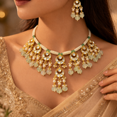 Pista Pearl Kundan Set
